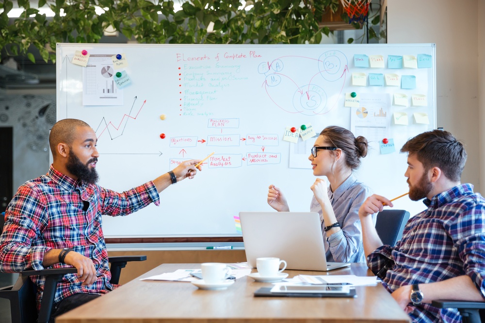 Multiethnic group of business people working together in office